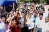 BJP, Congress workers mark victory in Mangaluru